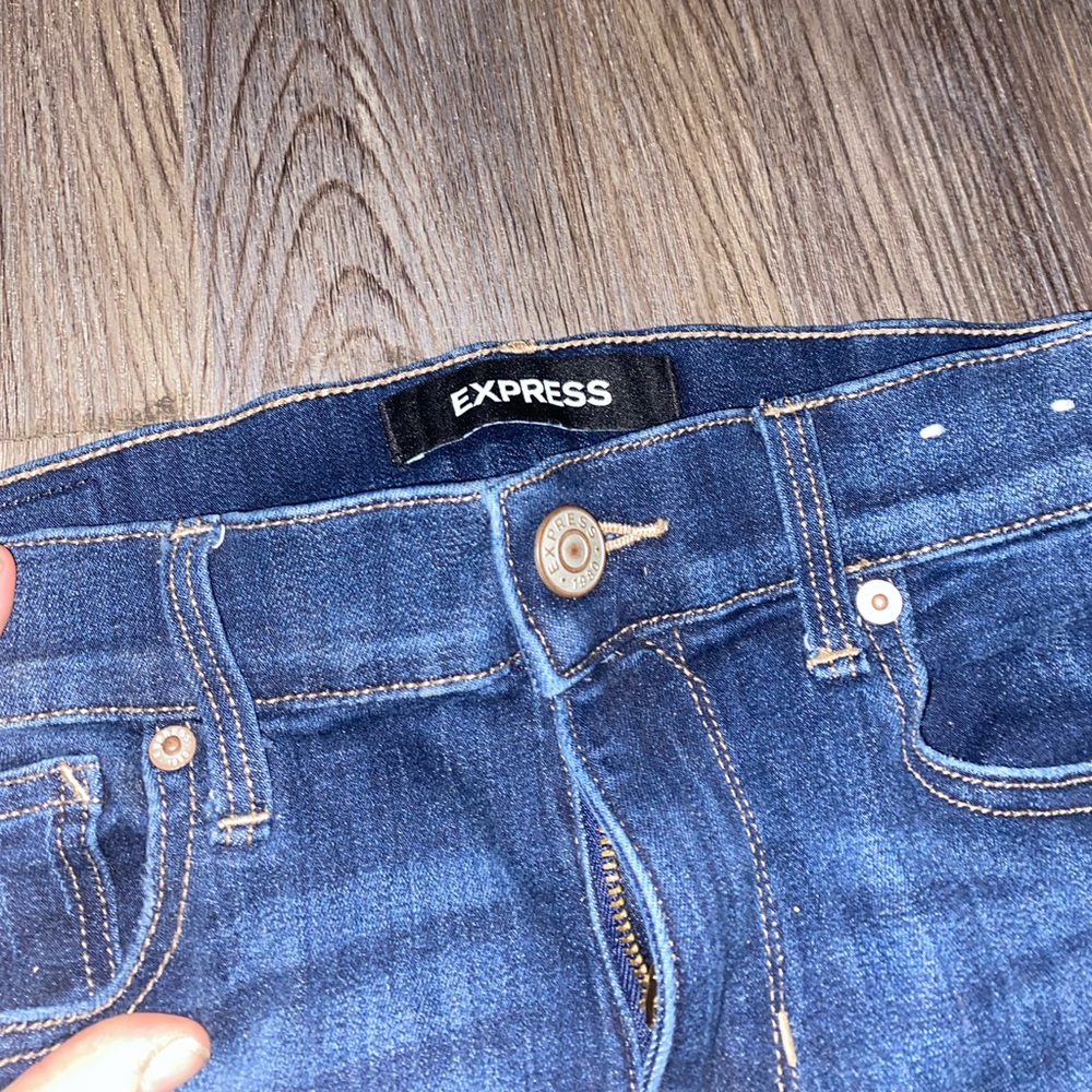 Dark wash Express boot cut mid rise jeans